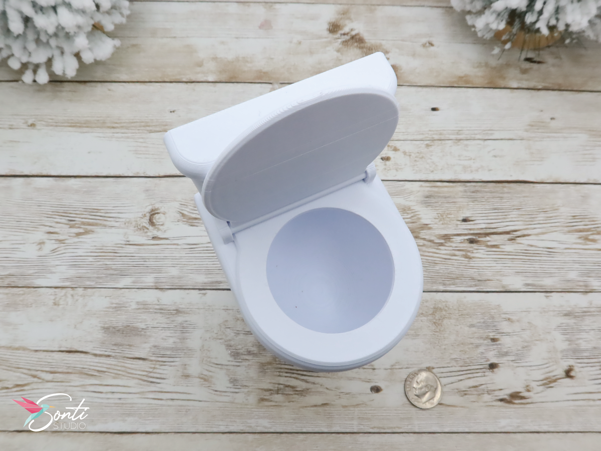 Deluxe Christmas Elf Newspaper and Toilet with Plunger, Toilet Paper Roll + Holder